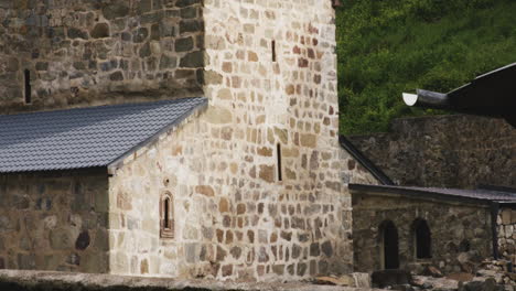 monastic church of mtsvane monastery with holy cross on renovated roof