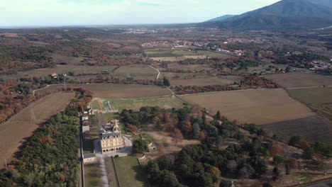 aerial view of a château and surrounding estate