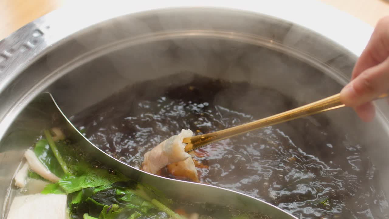 Cooking hot pot with vegetables and meat
