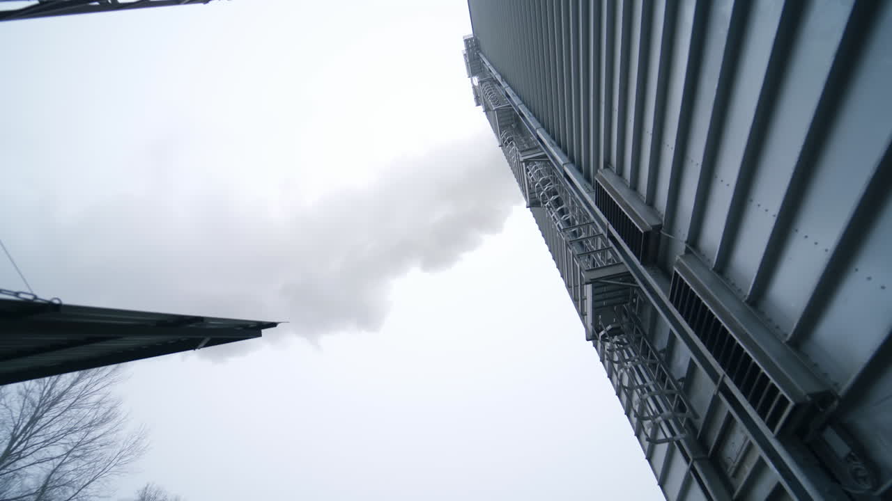 Huge modern elevator production. Big factory exterior construction.