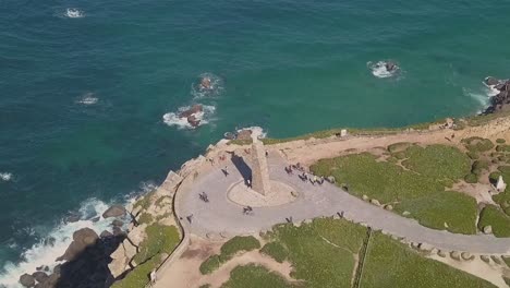 cross at cabo da roca cabo roca, portugal - the westernmost point of mainland europe