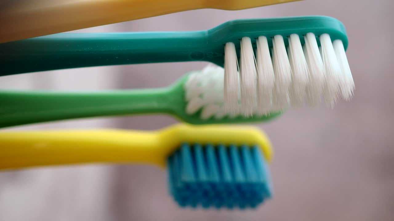 Close up of colorful toothbrushes