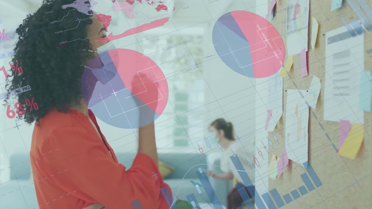 Animation of data processing over biracial businesswoman in face mask in office