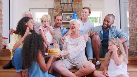 Family-and-friends-celebrating-grandma’s-birthday,-close-up