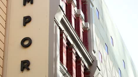 people passing by a department store entrance