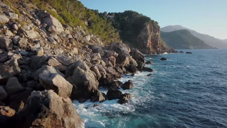 4k drone footage of a epic landscape scenery in europe - westcoast of mallorca - serra de tramuntana majorca - jurassic park - balearic islands spain mediterranean sea