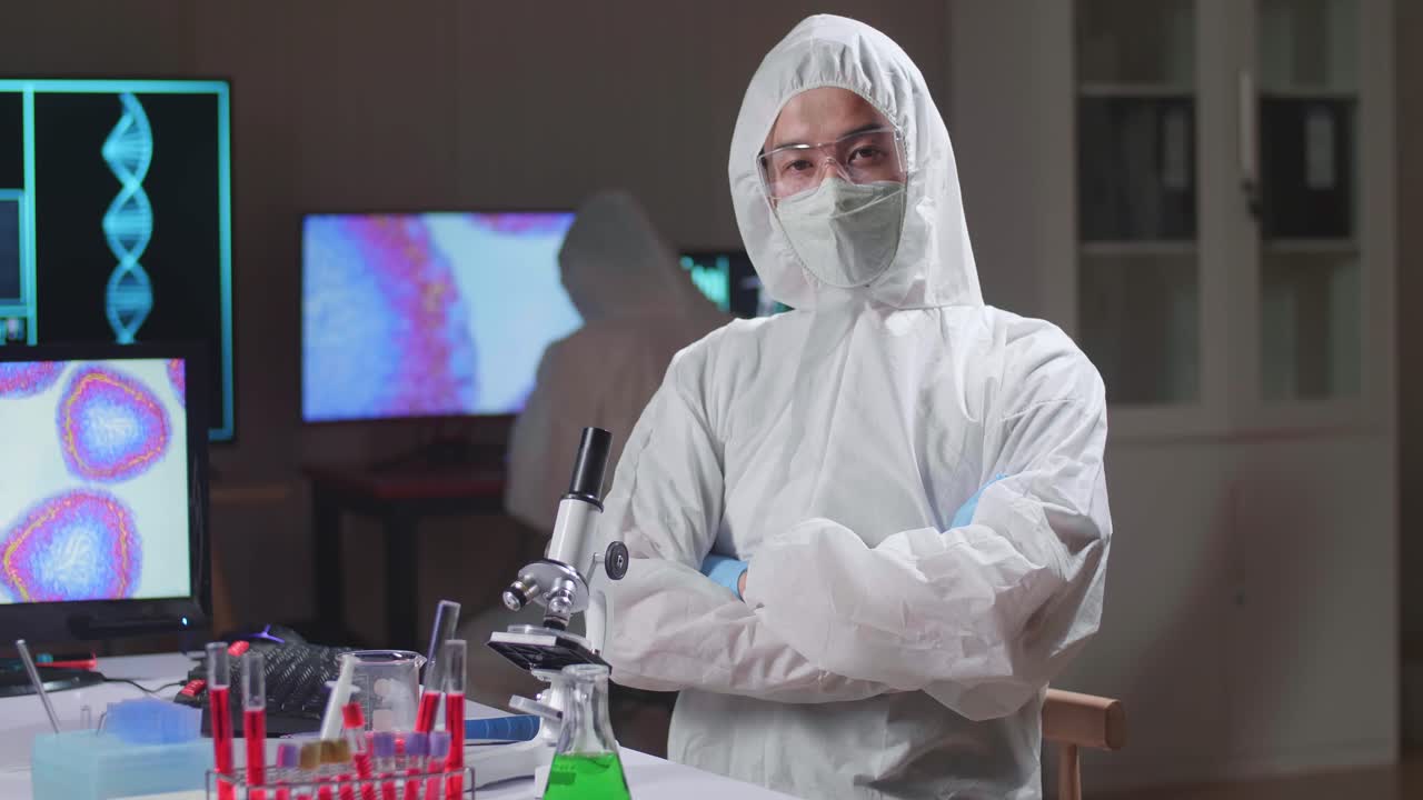 Asian Doctor Pose In A Modern Laboratory. Genetic Engineers Workplace. The Concept Of Science And Medicine