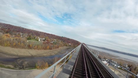 FPV drone following railroad bridge and going under it 1