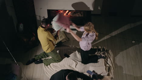 friends having a pillow fight at home