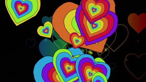 animación de corazones de arco iris sobre un fondo negro