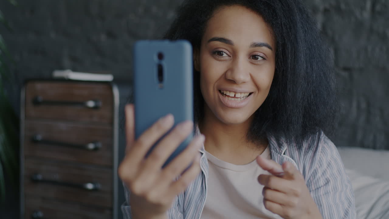 Woman Video Chatting on Smartphone