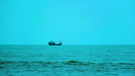 Fishing-Trawler-Boat-In-The-Indian-Ocean-Before-The-Storm-In-Kuakata,-Bangladesh