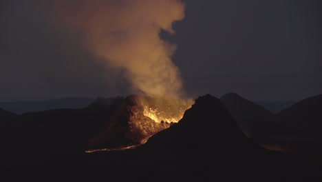 swirling smoke tornado from erupting volcano crater iceland