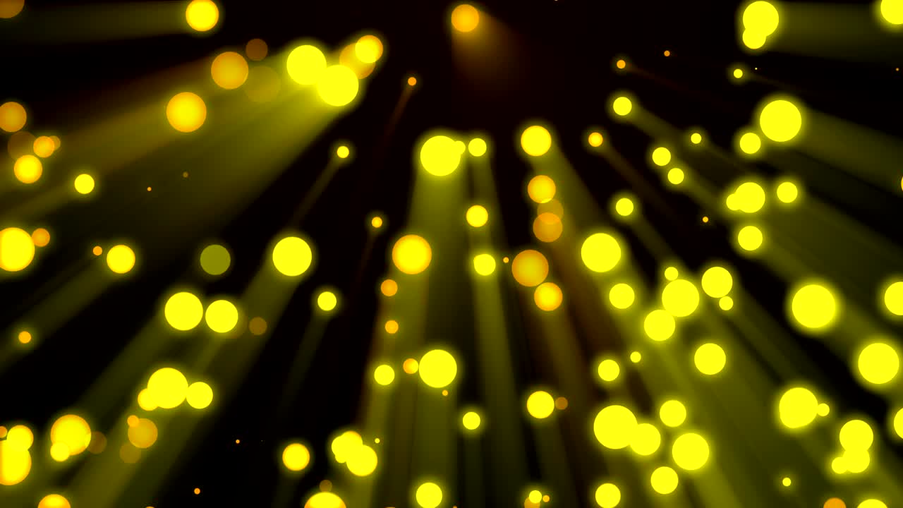 sfondo loopable particelle dorate volanti in fasci di luce