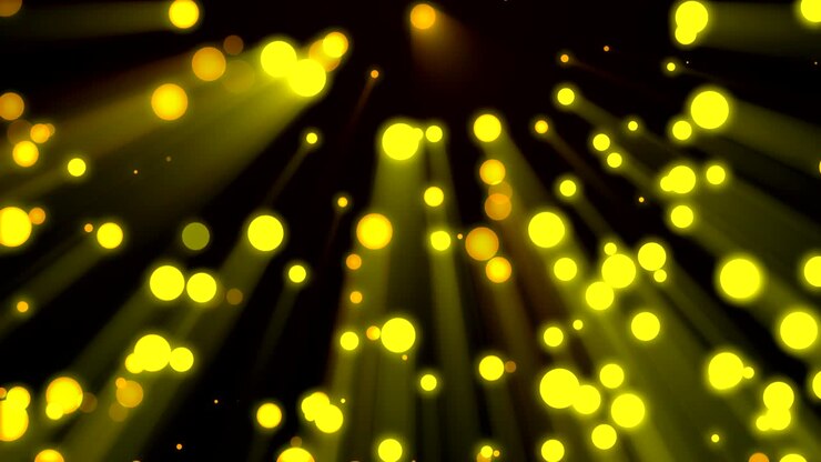 sfondo loopable particelle dorate volanti in fasci di luce