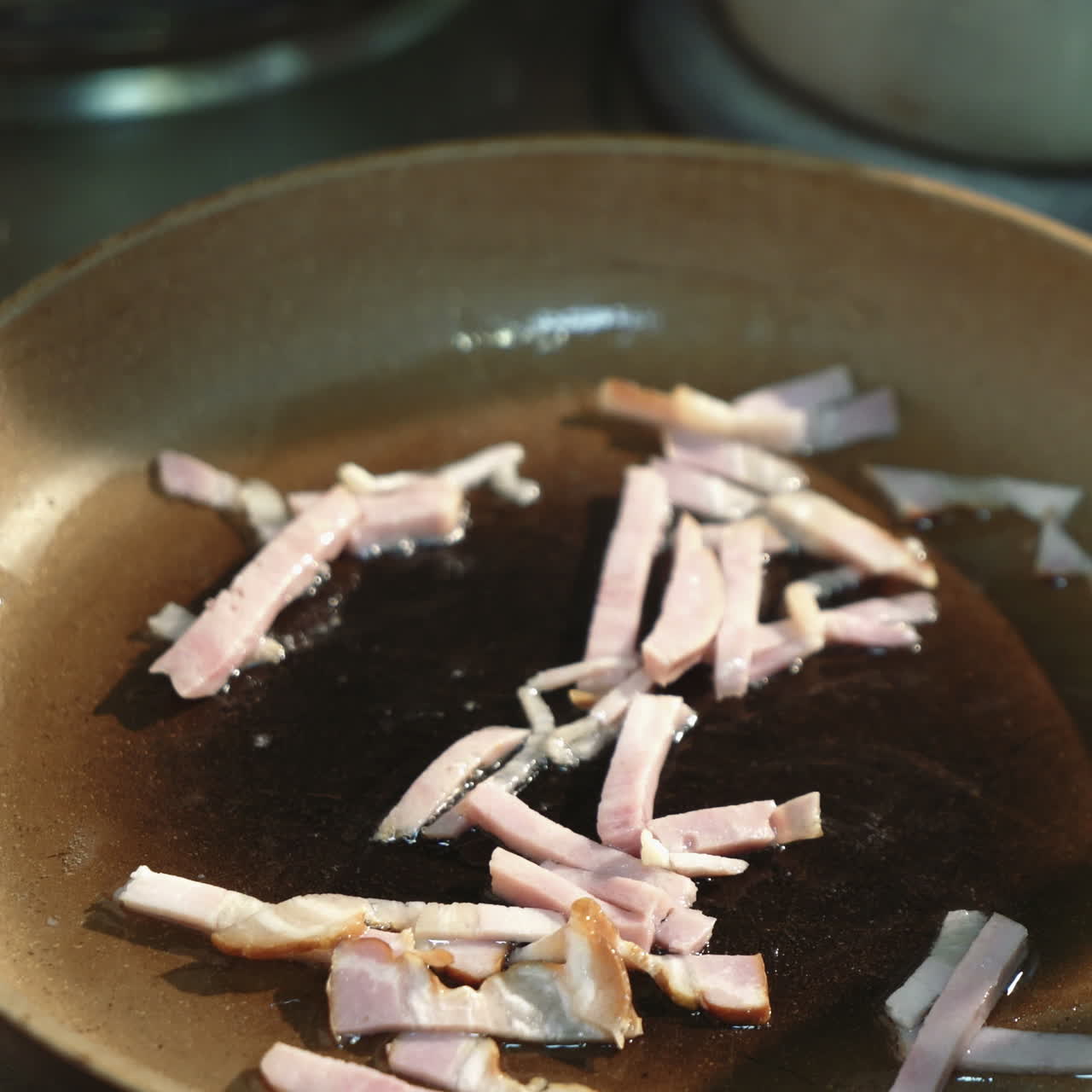 Frying bacon in a frying pan Sqare video