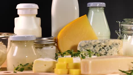 variety of dairy items on a black background