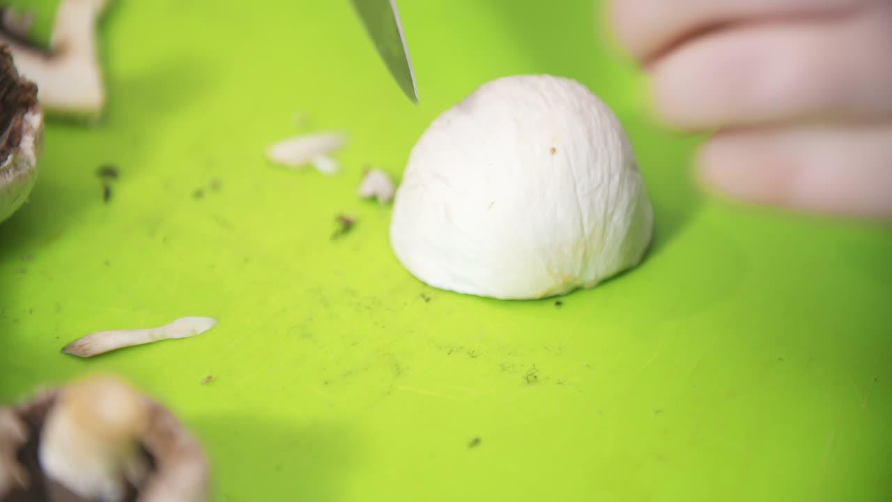 Housewife Slicing Mushrooms In The Kitchen For Cooking 3