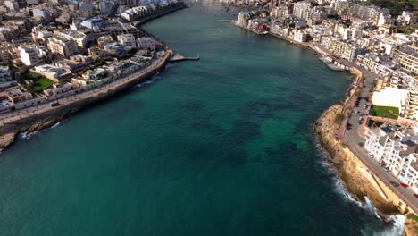 Aerial-view-of-Marsascala-harbour-on-a-sunny-day,-Malta