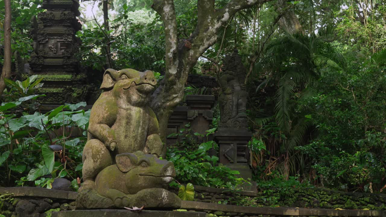 Bali island Monkey forest stone pigs sculpture Indonesia Southeast Asia