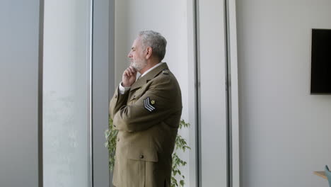 man looking out of the window