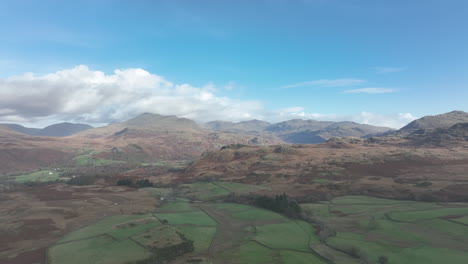 Birker-Fell,-Lake-District,-aerial-pull-back-from-mountains---November-2022,-DJI-Mavic-3-Cine,-Prores-422,-light-grade---clip-2