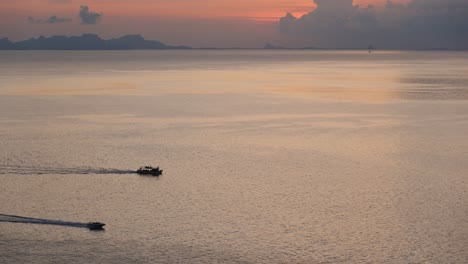 Drone-footage-of-ships-in-Thai-ocean-with-clouds-on-horizon