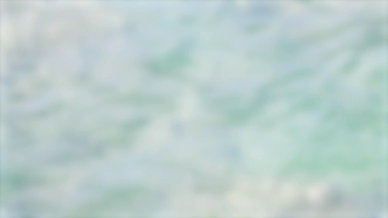 A seamless loop of soft ocean waves creating a calming, textured background with subtle motion and pastel hues