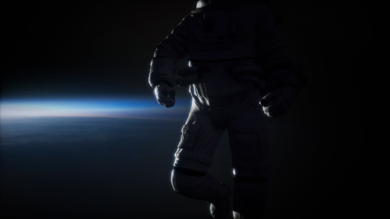 Astronaut in outer space against the backdrop of the planet earth. image of the Earth furnished by NASA