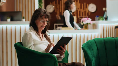 hotel guest using modern device