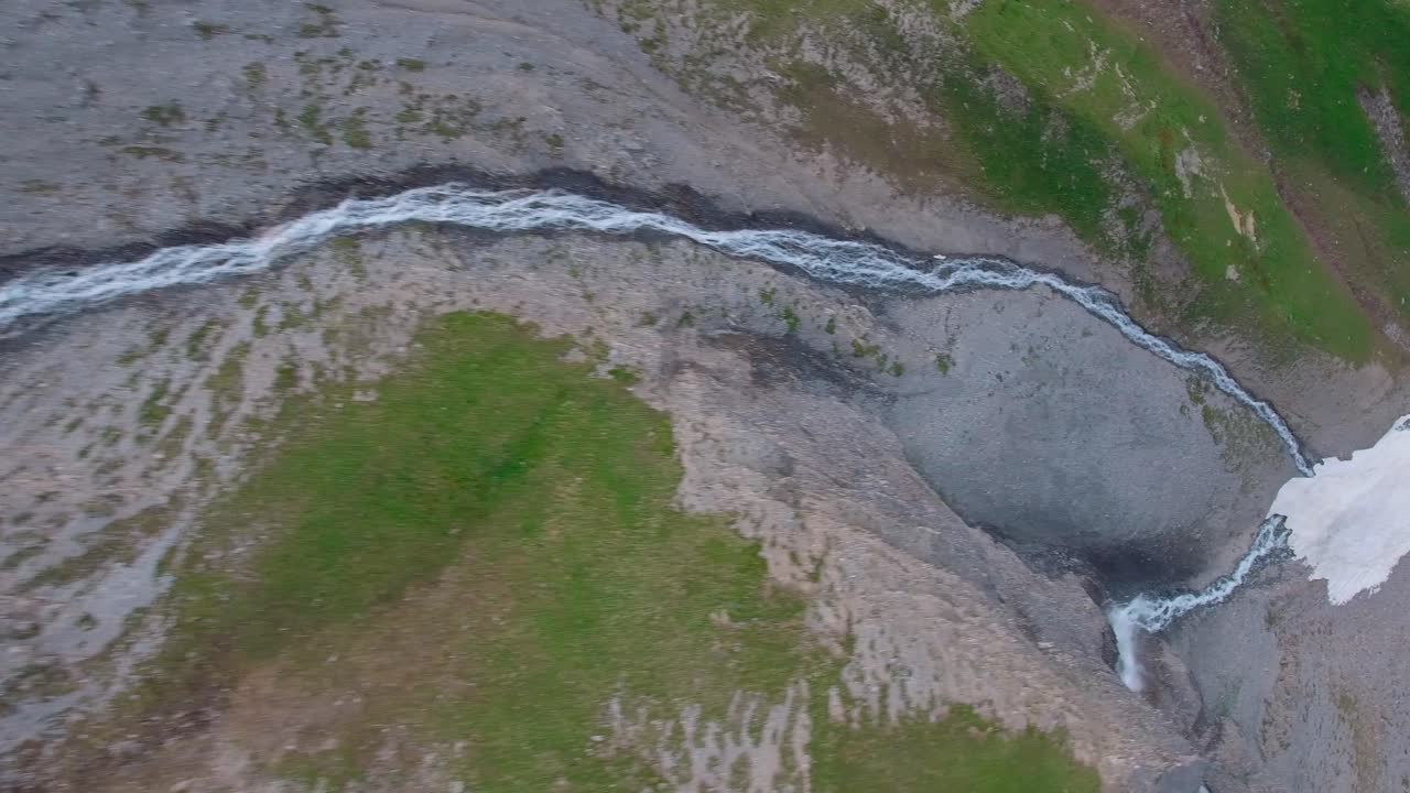 Drone shot above the French Alps in early summer 2