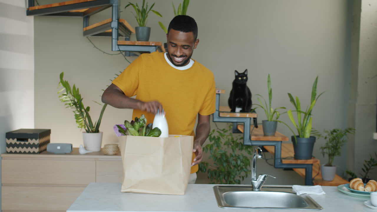 Man Shopping for Groceries at Home
