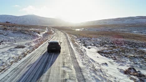 a roadtrip through the snowy country of island in iceland - aerial