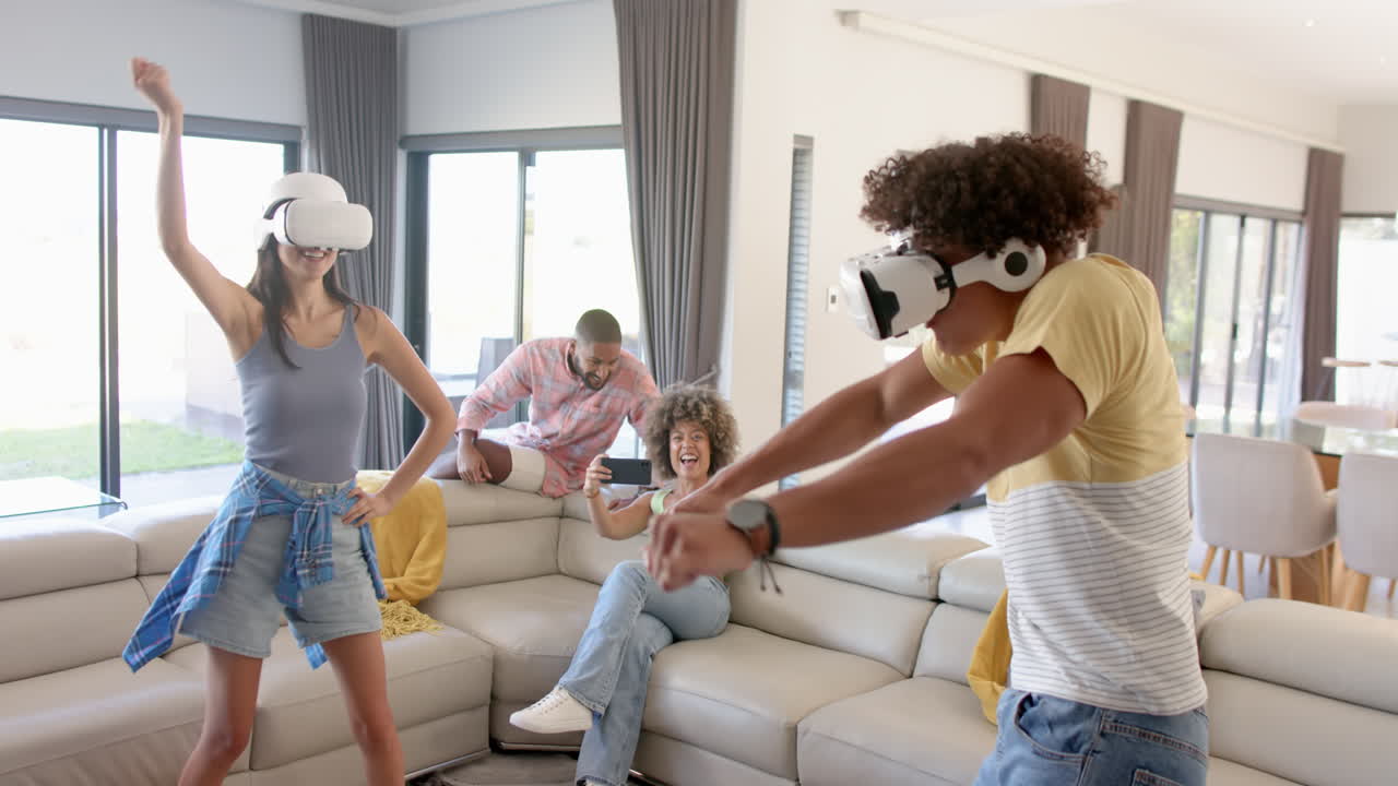 At home, Playing VR games, diverse friends enjoying virtual reality experience in living room