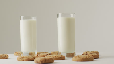 Video-of-biscuits-with-chocolate-and-milk-on-white-background