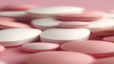 close-up of assorted pink and white pills
