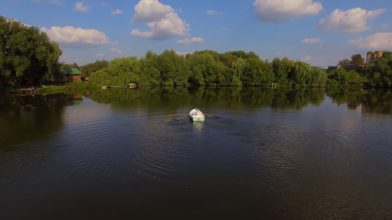 aerial view of bride and groom on the boat 06