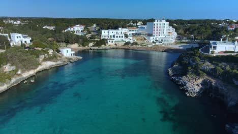 aerial flyover luxury yacht in harbour of menorca