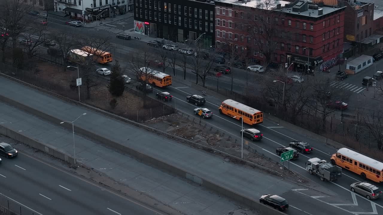 Traffic on highway in New York with buses and cars during the day