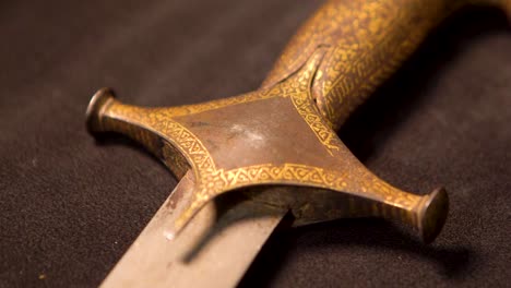 close-up of an antique ornate sword