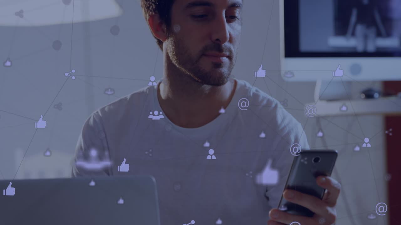 Network of digital icons against caucasian man using smartphone at home