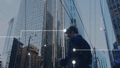 businessman using smartphone, data network animation over city skyscrapers