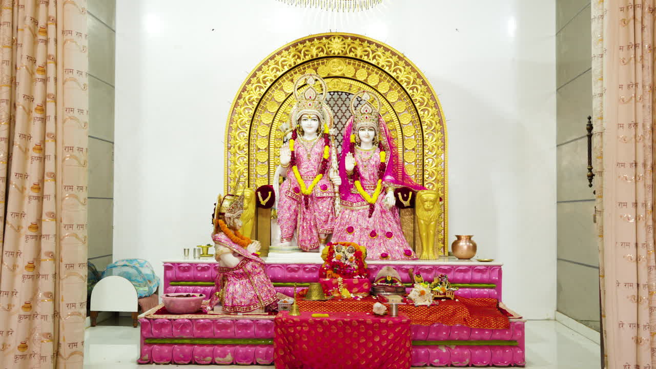 Cinematic track-out shot of hindu deity Lord Rama, Inside view of an Indian temple of Lord Rama.