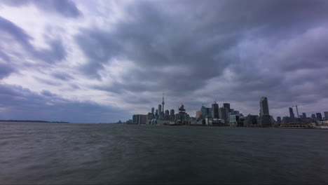 timelapse of the toronto skyline from across the bay at polson pier