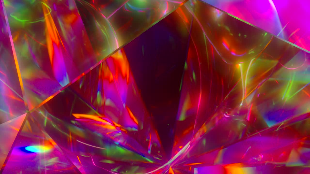빛은 천천히 회전하는 다이아몬드의 면을 통과하여 반복되는 반이는 하이라이트와 밝은 무지개 색을 만니다.