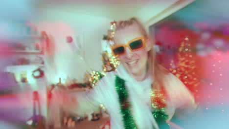 excited woman singing while dancing at illuminated home during christmas