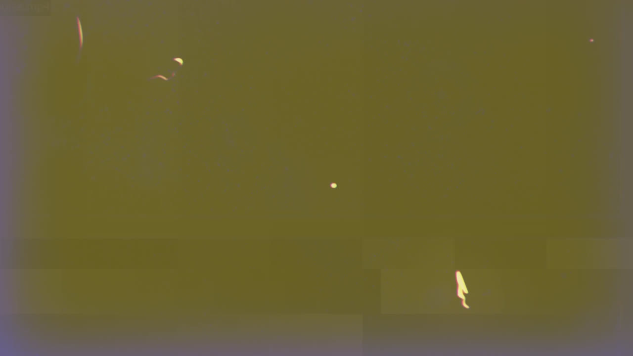 animación de múltiples manchas que se mueven en movimiento hipnótico en un fondo verde angustiado