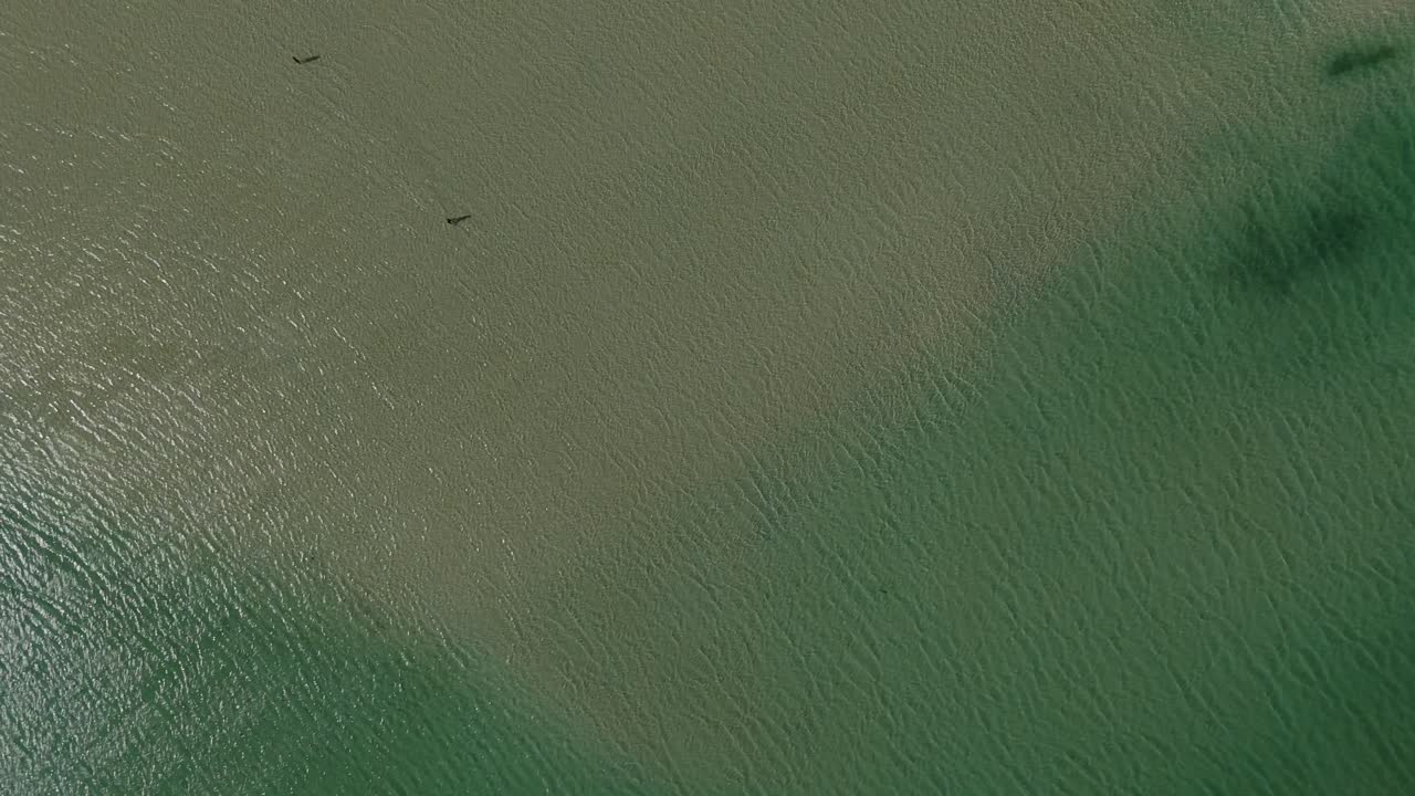 Aerial - textured turquoise water with subtle ripples at Balos Lagoon, Crete, Greece