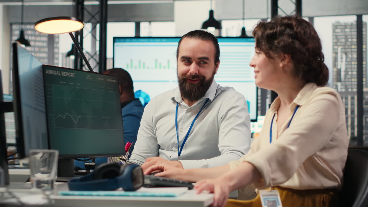 Vertical Video Corporate manager and assistant collaborating on a new expansion vision