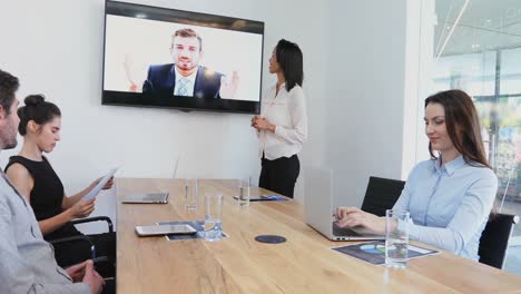 Business-colleagues-attending-a-video-call-in-conference-room-4k
